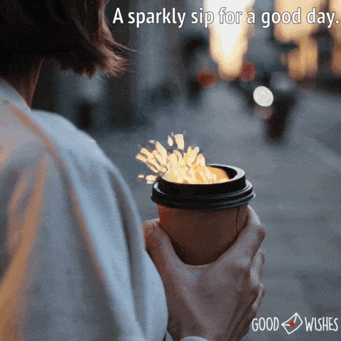 sparkling gold/good vibes out of a coffee cup - woman holding - animatyed gif