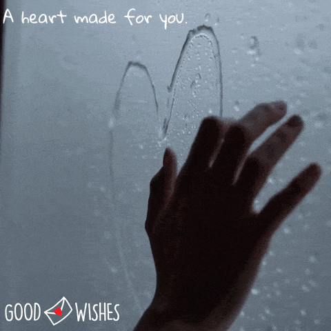 foggy window - a hand drawing a heart - animated love gif